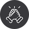 White icon of two hands clasped together in a handshake gesture, symbolizing teamwork and collaboration, on a dark circular background